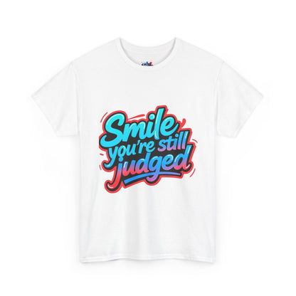 Colorful Graphic Tee: Smile You're Still Judged, Unisex Heavy Cotton Shirt, Casual Fashion, Gift for Friends, Statement Tee, Everyday Wear